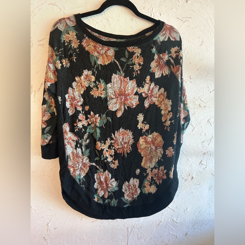 Maurices very soft sweater with rounded hem.